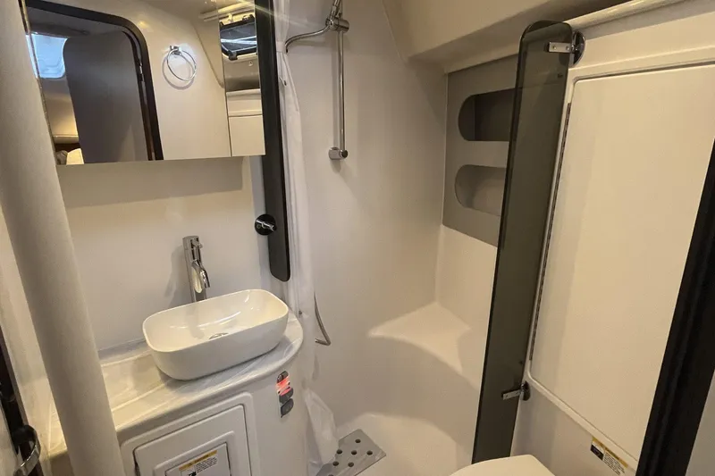 Slide: The Image of Modern bathroom interior of 2026 Catalina 386 yacht, featuring sleek sink and shower. - 24