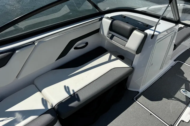 Slide: The Image of 2020 Yamaha AR210 boat interior with sleek seating and modern design. - 13