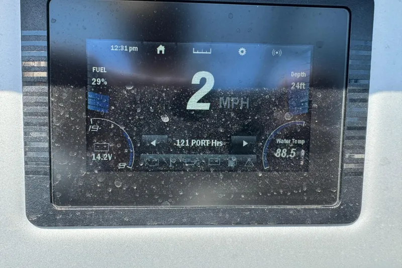 Slide: The Image of Display screen of a 2020 Yamaha AR210 boat showing speed, fuel, and water temperature. - 19