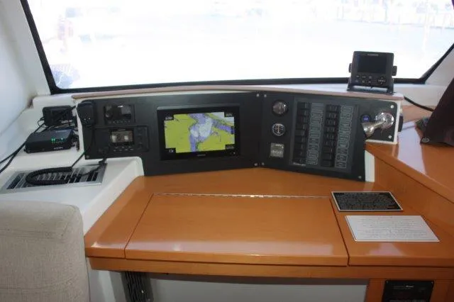 Slide: The Image of Control panel of a 2008 Fountaine Pajot Orana 44 catamaran with navigation equipment. - 27