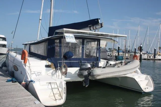 Slide: The Image of 2008 Fountaine Pajot Orana 44 catamaran docked at marina. - 3