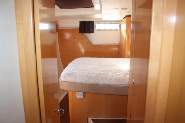Slide: The Image of Interior cabin of 2008 Fountaine Pajot Orana 44 catamaran with bed and window. - 37