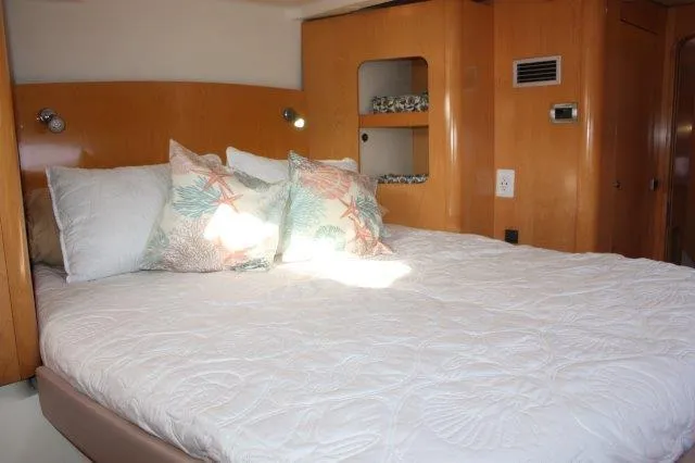 Slide: The Image of 2008 Fountaine Pajot Orana 44 master cabin with cozy bed and decorative pillows. - 38