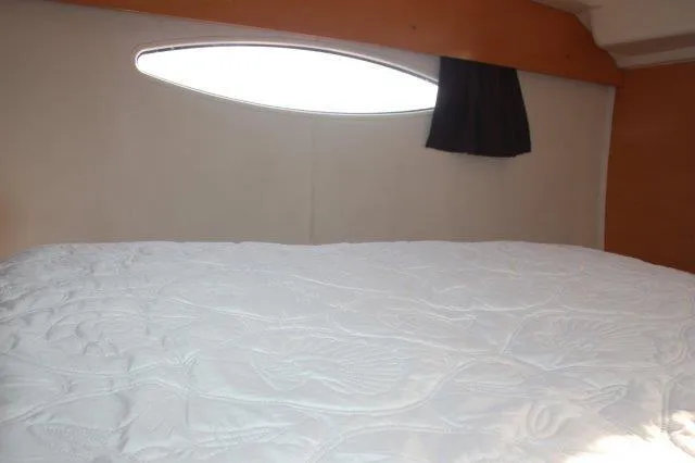Slide: The Image of Interior cabin of 2008 Fountaine Pajot Orana 44 catamaran with bed and window. - 40