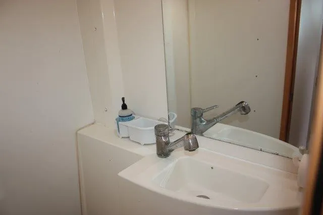 Slide: The Image of 2008 Fountaine Pajot Orana 44 bathroom sink with mirror and faucet. - 41