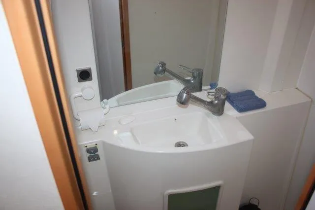 Slide: The Image of Compact bathroom sink in 2008 Fountaine Pajot Orana 44 catamaran. - 49