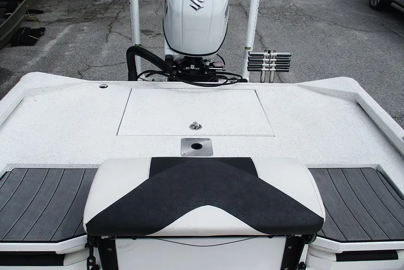 Slide: The Image of 2023 Vexus AVX2180CC boat deck with motor and seating area. - 20