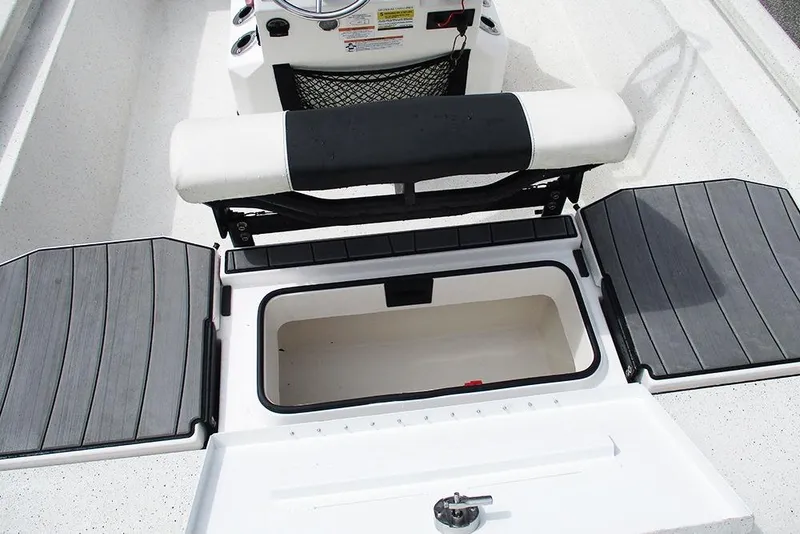 Slide: The Image of 2023 Vexus AVX2180CC boat interior with storage compartment and seating. - 23