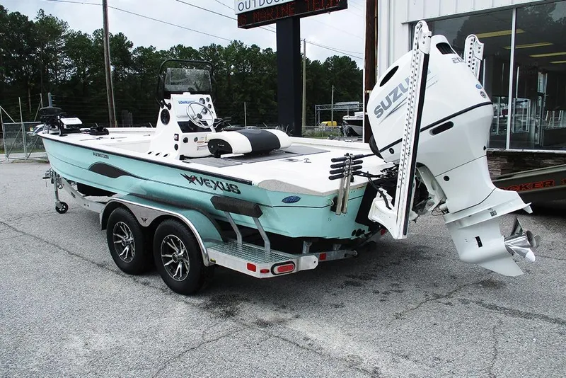 Slide: The Image of 2023 Vexus AVX2180CC boat with Suzuki outboard motor on a trailer. - 3