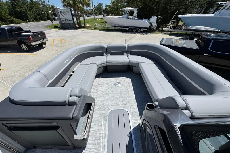 Slide: The Image of 2026 Bennington 24 MSB pontoon boat with spacious gray seating and modern design. - 18