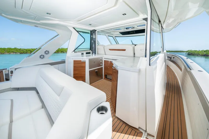 Slide: The Image of Manufacturer Provided Image: 2023 Tiara Yachts 48 LS interior with luxurious seating and modern amenities. - 14