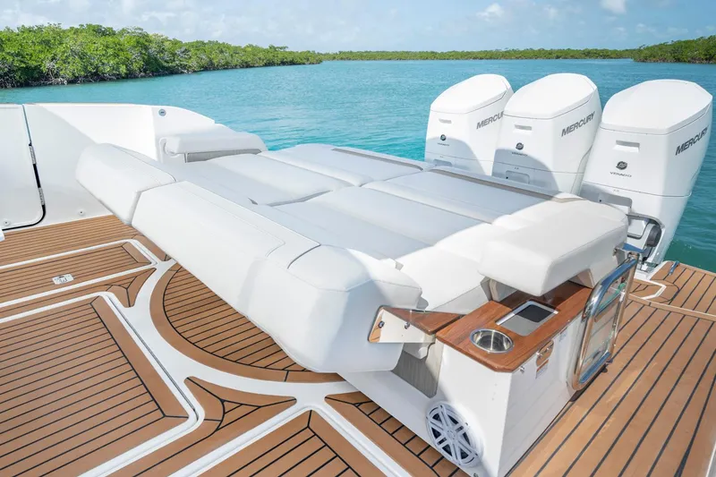 Slide: The Image of Manufacturer Provided Image: 2023 Tiara Yachts 48 LS luxury boat with triple Mercury outboard engines. - 8