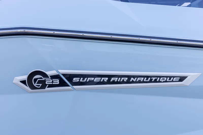 Slide: The Image of 2026 Nautique Super Air Nautique G23 logo on light blue boat exterior. - 11
