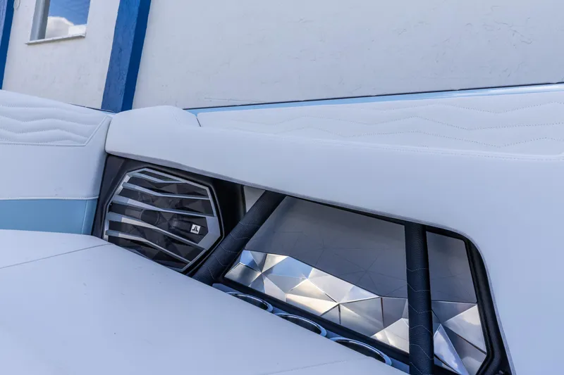 Slide: The Image of 2026 Nautique Super Air Nautique G23 interior with sleek speaker design and modern upholstery. - 24