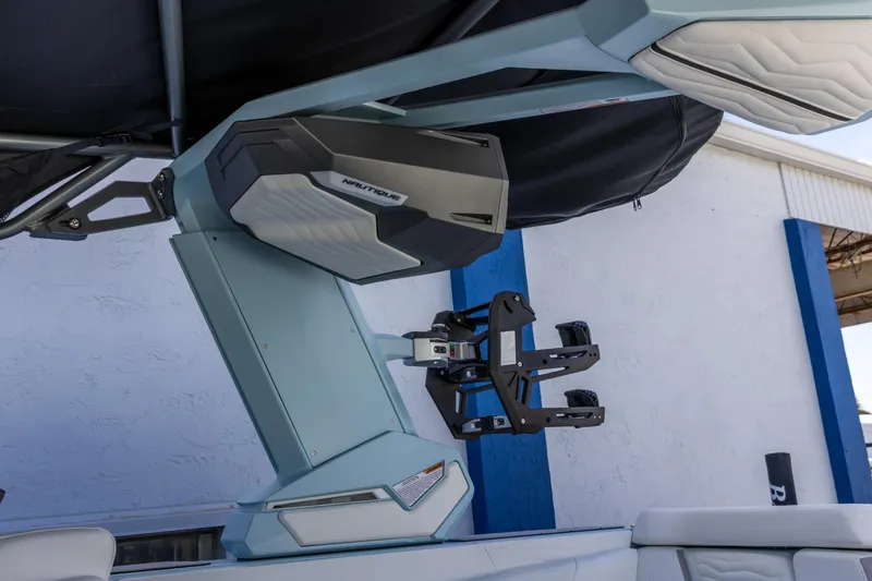 Slide: The Image of 2026 Nautique Super Air Nautique G23 boat tower with speakers and board racks. - 26