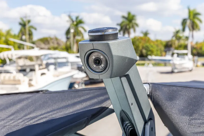 Slide: The Image of Close-up of a 2026 Nautique Super Air Nautique G23 camera system on a boat. - 28
