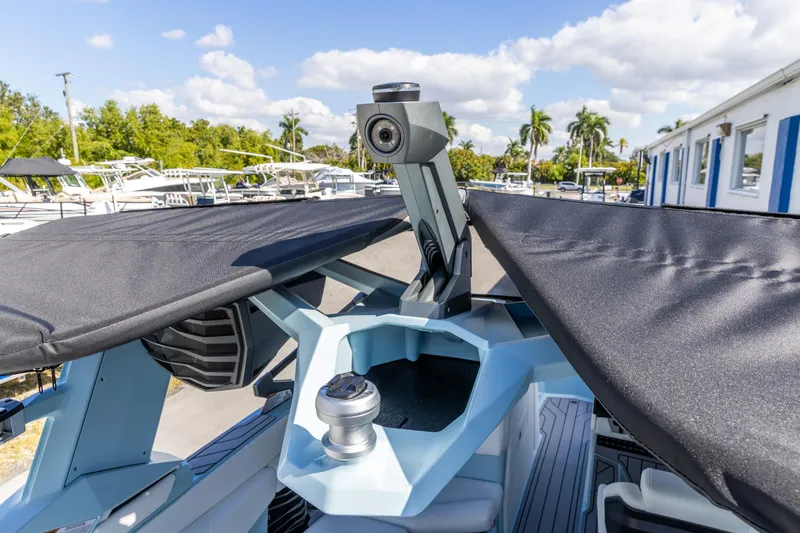 Slide: The Image of 2026 Nautique Super Air Nautique G23 boat with advanced camera system and sleek design. - 29