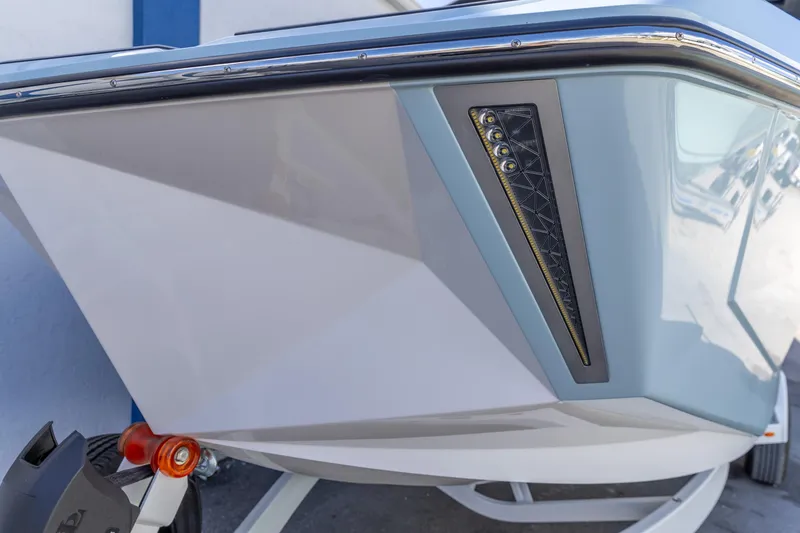 Slide: The Image of 2026 Nautique Super Air Nautique G23 boat detail with sleek design and modern lighting. - 32