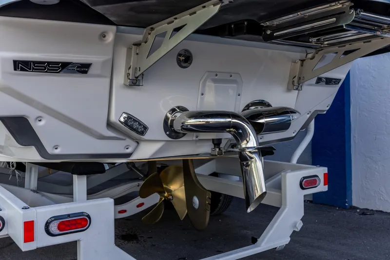 Slide: The Image of 2026 Nautique Super Air Nautique G23 boat stern with NSS system and propeller. - 6