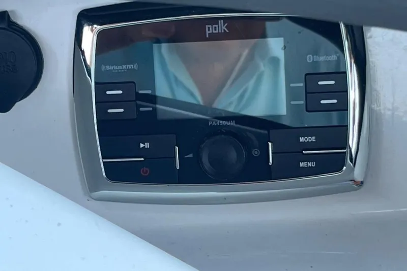 Slide: The Image of Polk audio system in 2015 Tigé RZ 2 boat dashboard, featuring Bluetooth and SiriusXM. - 24