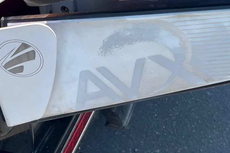 Slide: The Image of 2015 Tigé RZ 2 AVX logo on boat's rear platform. - 4