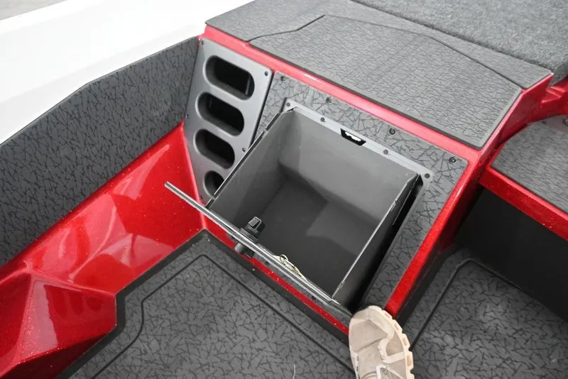 Slide: The Image of 2026 Vexus VX s21 boat interior with open storage compartment and red accents. - 12