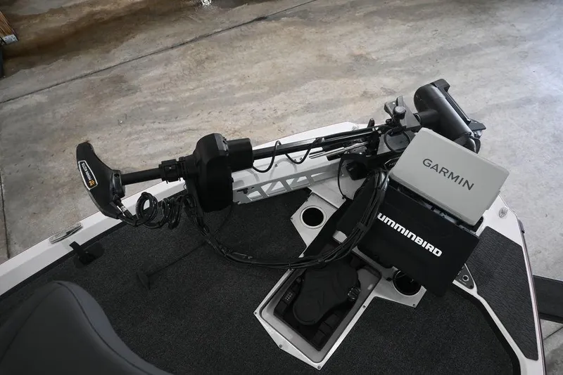 Slide: The Image of 2026 Vexus VX s21 boat with Garmin and Humminbird electronics on deck. - 14