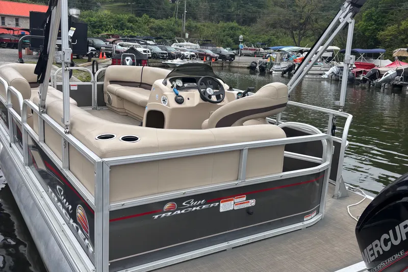 Slide: The Image of 2017 Sun Tracker Party Barge 18 DLX pontoon boat docked at marina. - 5