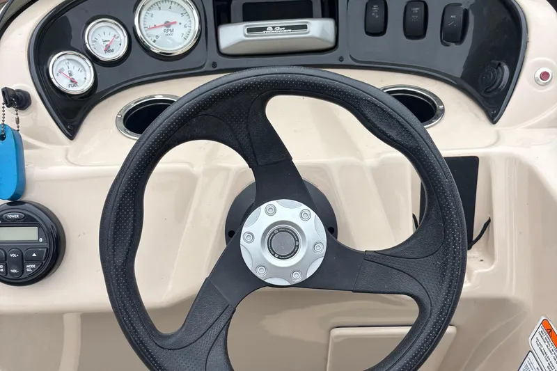 Slide: The Image of Steering wheel and dashboard of 2017 Sun Tracker Party Barge 18 DLX pontoon boat. - 7