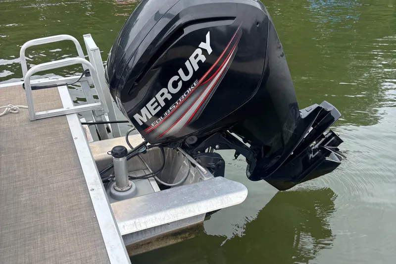 Slide: The Image of Mercury outboard motor on 2017 Sun Tracker Party Barge 18 DLX pontoon boat. - 8