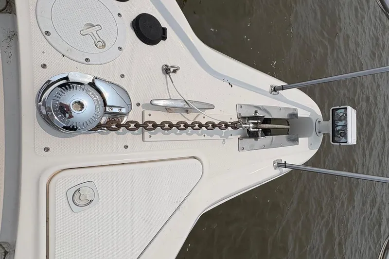 Slide: The Image of Bow of 2001 Sea Ray 460 Sundancer with anchor chain and winch system. - 21