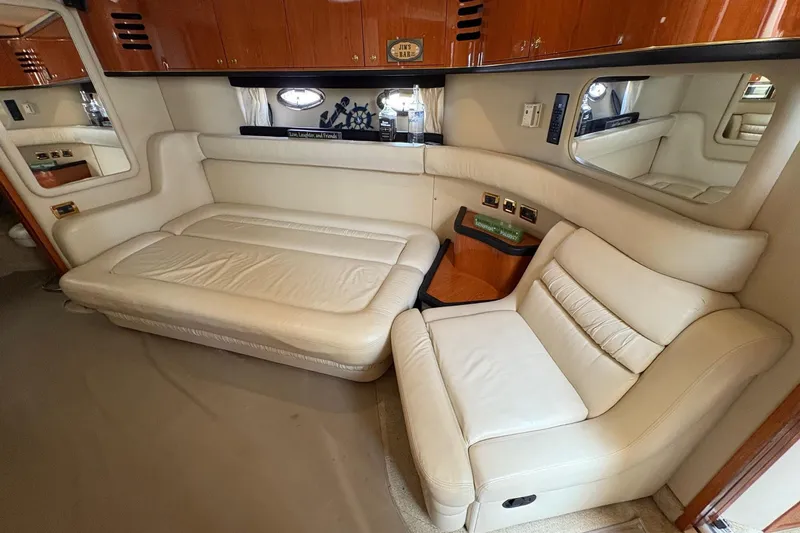 Slide: The Image of Luxurious interior of 2001 Sea Ray 460 Sundancer yacht with cream leather seating. - 43