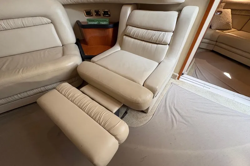 Slide: The Image of Luxurious beige leather seating in 2001 Sea Ray 460 Sundancer yacht interior. - 44
