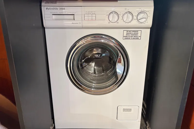 Slide: The Image of Splendide 2000 washer and dryer unit on a 2001 Sea Ray 460 Sundancer yacht. - 59