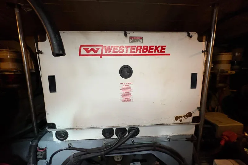 Slide: The Image of Westerbeke generator in 2001 Sea Ray 460 Sundancer engine room. - 64