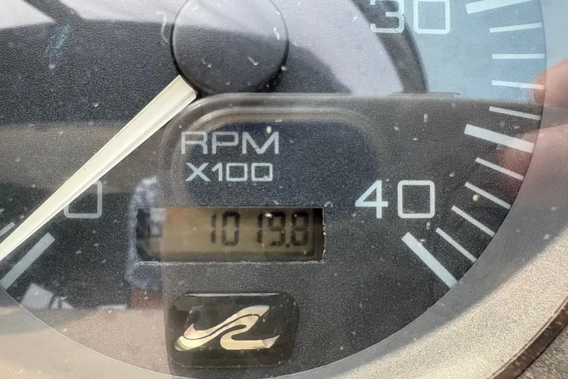 Slide: The Image of Close-up of 2001 Sea Ray 460 Sundancer RPM gauge showing 1019.0 RPM. - 67