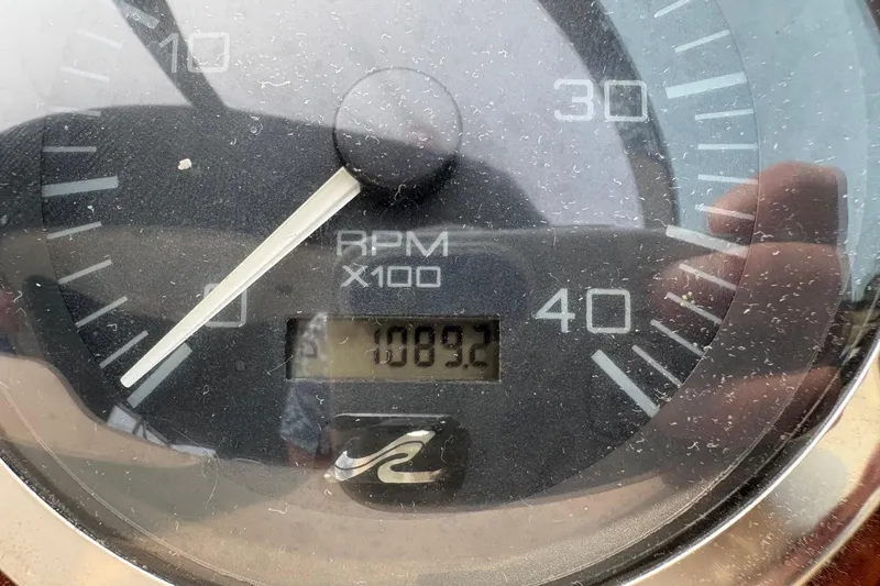 Slide: The Image of Close-up of a 2001 Sea Ray 460 Sundancer RPM gauge showing 1089.2 hours. - 68