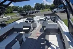 Slide: The Image of 2021 Tahoe 210 S Limited boat interior with seating and steering wheel. - 6