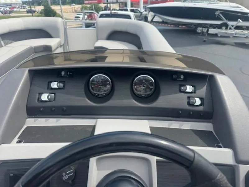 Slide: The Image of Dashboard of a 2022 Bennington 25 LSB boat with gauges and controls. - 12
