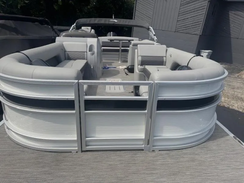 Slide: The Image of 2022 Bennington 25 LSB pontoon boat with spacious seating and modern design. - 18