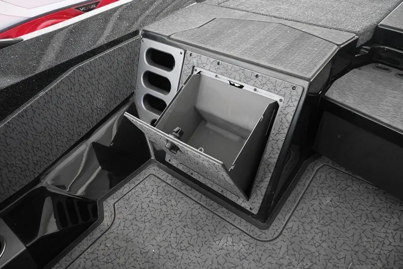 Slide: The Image of 2026 Vexus VX s21 boat storage compartment with open lid, showcasing interior design. - 10