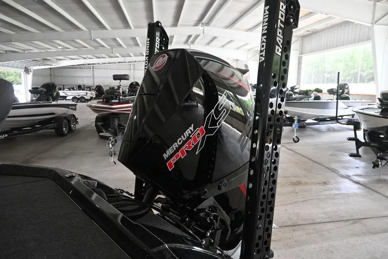 Slide: The Image of 2026 Vexus VX s21 boat interior with blue seats and central console. - 2