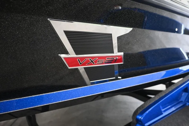Slide: The Image of 2026 Vexus VX s21 boat with Mercury Pro XS engine in a showroom. - 3