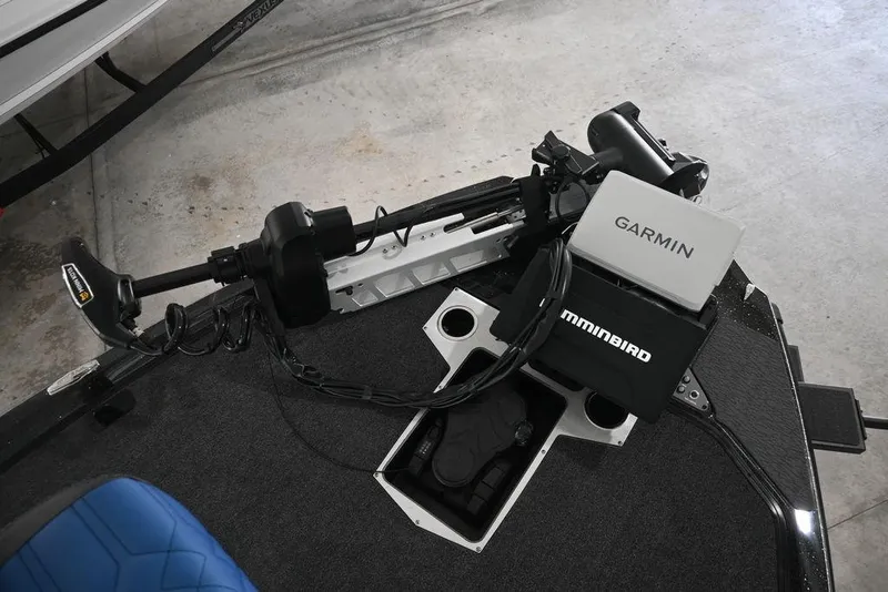 Slide: The Image of 2026 Vexus VX s21 boat deck with Garmin and Humminbird electronics. - 8