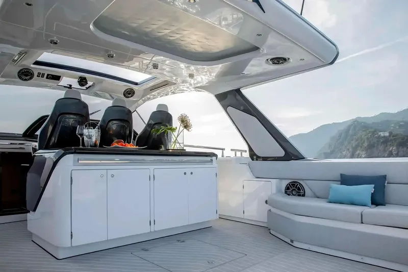 Slide: The Image of Luxurious 2025 Azimut Verve 48 yacht interior with sleek seating and modern design. - 6