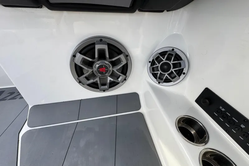 Slide: The Image of 2023 Axis A225 boat interior with speakers and control panel. - 19