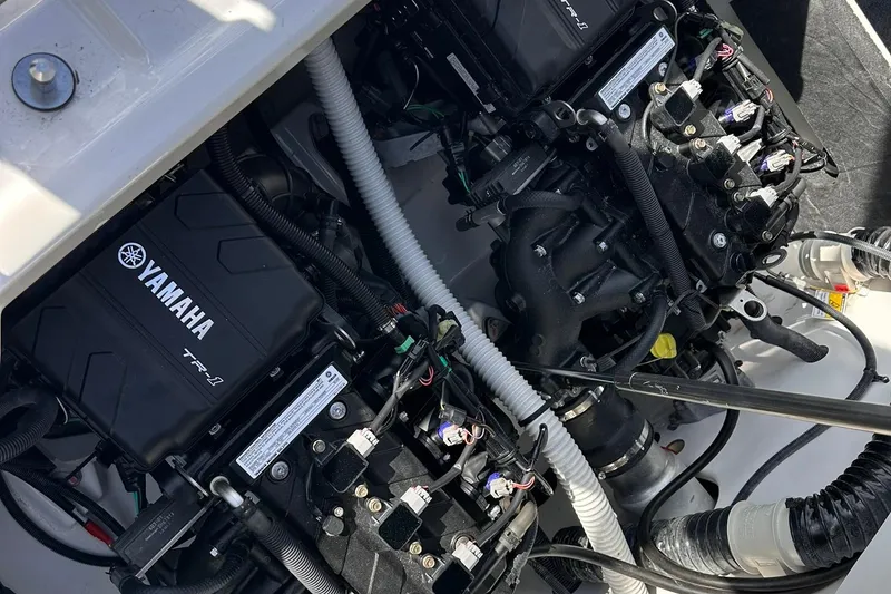 Slide: The Image of 2025 Yamaha AR220 boat engine compartment with dual TR-1 engines. - 23
