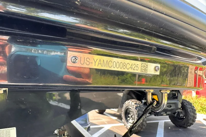 Slide: The Image of 2025 Yamaha Boats AR220 hull identification number plate with QR code. - 24
