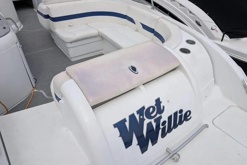 Slide: The Image of 2005 Formula 260 Bowrider boat interior with "Wet Willie" text on seating area. - 15