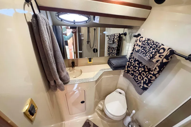 Slide: The Image of Luxurious bathroom in 2002 Cruisers Yachts 3870 Express with elegant decor and modern amenities. - 30